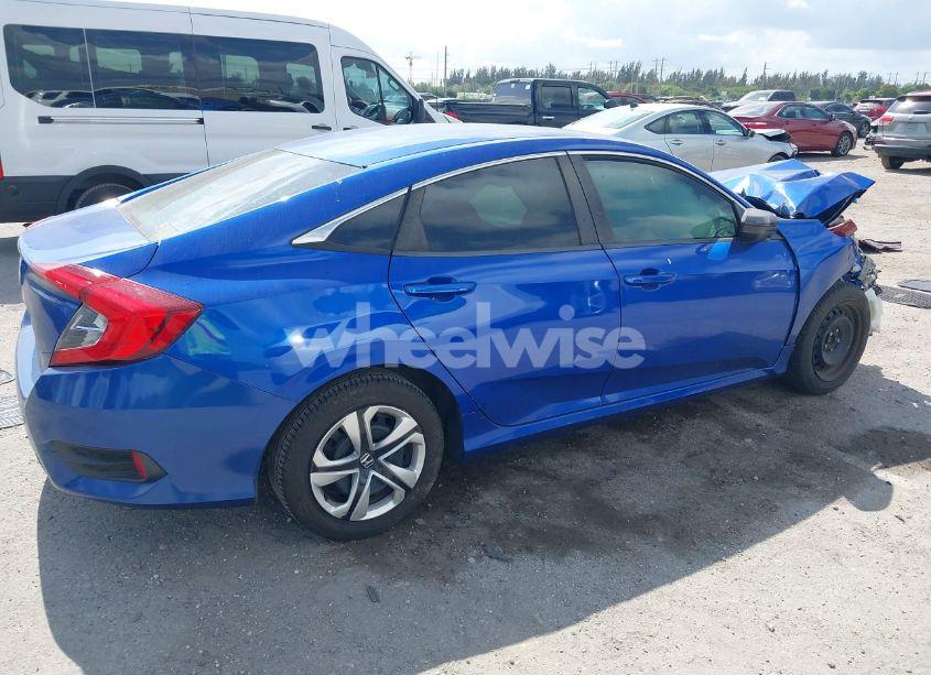 Photo 4 of 2018 Honda Civic LX (VIN 19XFC2F52JE043148)