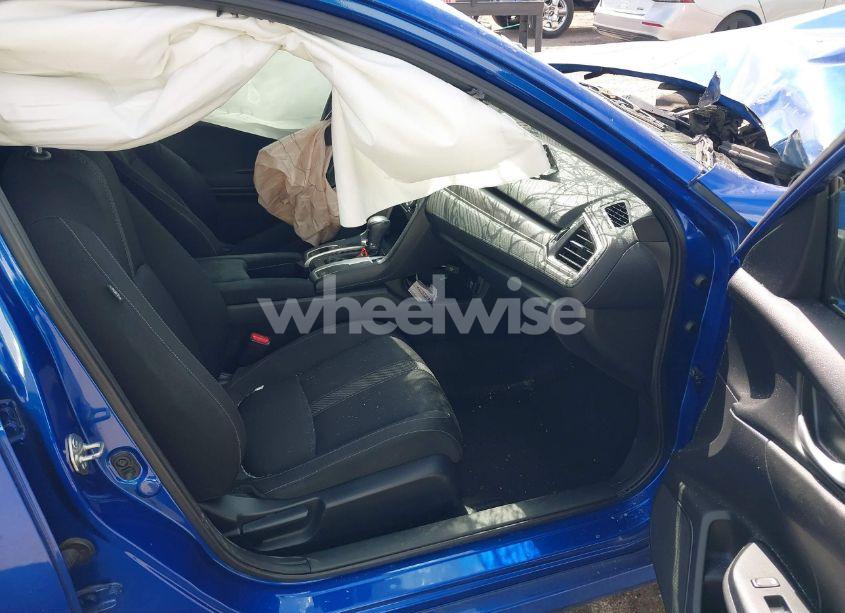 Photo 5 of 2018 Honda Civic LX (VIN 19XFC2F52JE043148)