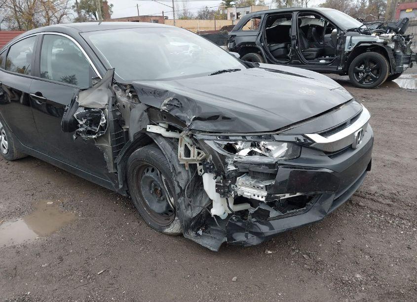 Photo 6 of 2018 Honda Civic LX (VIN 19XFC2F52JE043490)