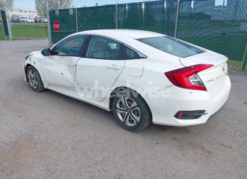 Photo 3 of 2018 Honda Civic LX (VIN 19XFC2F52JE202864)