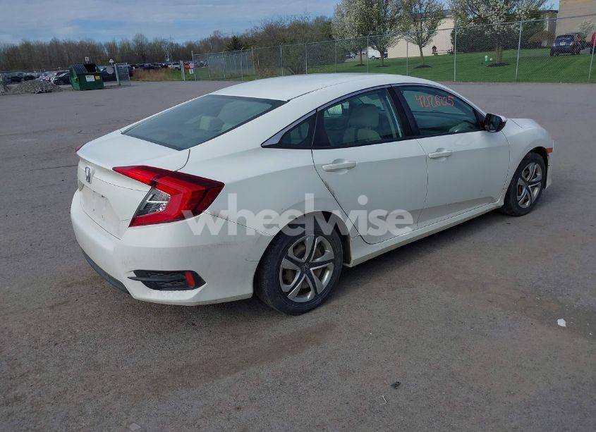 Photo 4 of 2018 Honda Civic LX (VIN 19XFC2F52JE202864)
