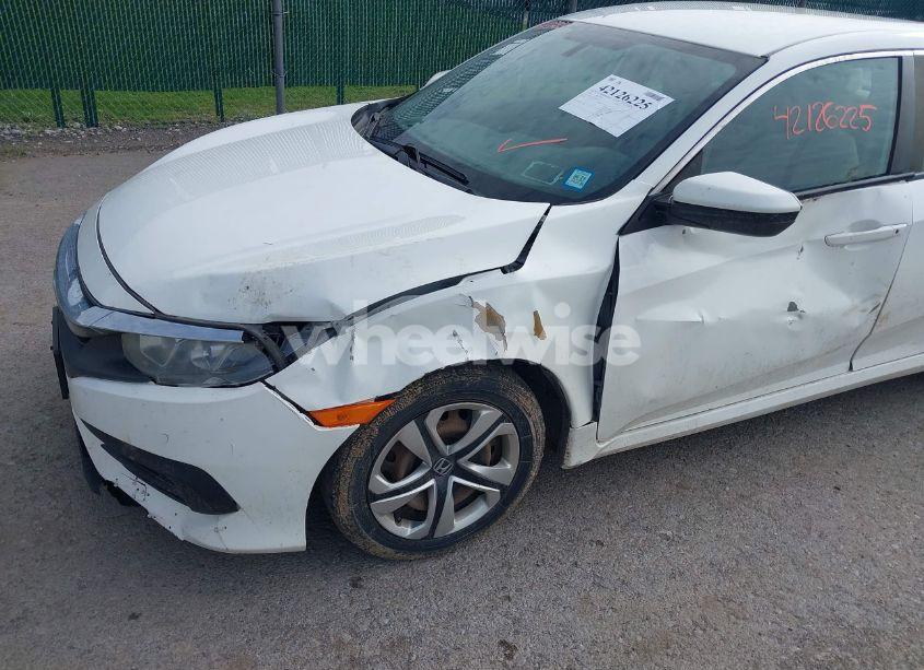 Photo 6 of 2018 Honda Civic LX (VIN 19XFC2F52JE202864)