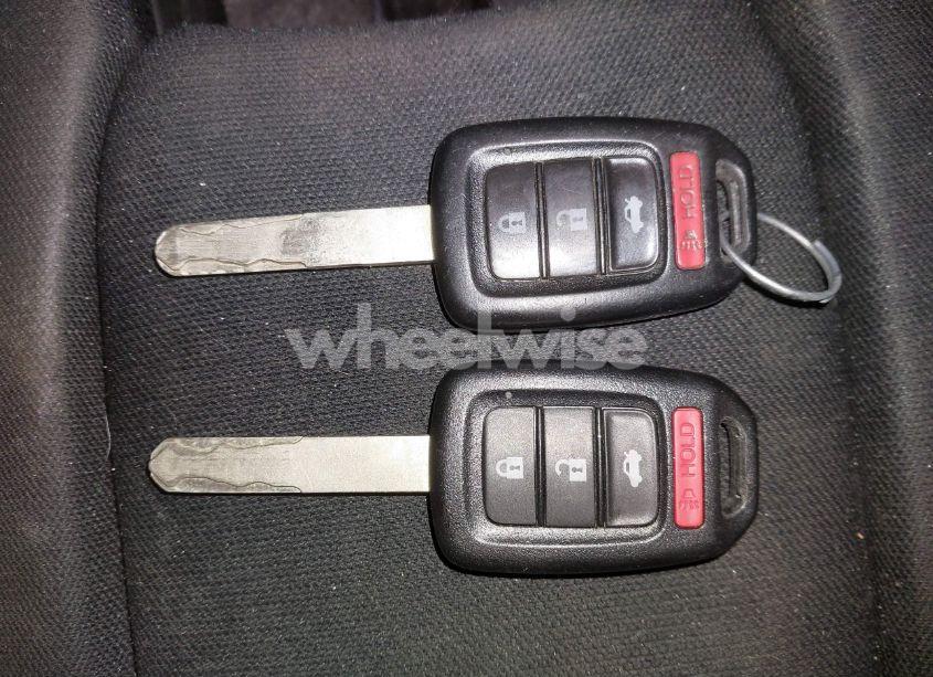 Photo 11 of 2018 Honda Civic LX (VIN 19XFC2F52JE203271)