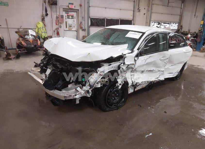 Photo 2 of 2018 Honda Civic LX (VIN 19XFC2F52JE203271)