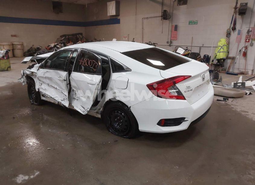 Photo 3 of 2018 Honda Civic LX (VIN 19XFC2F52JE203271)