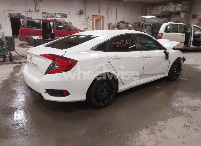 Photo 4 of 2018 Honda Civic LX (VIN 19XFC2F52JE203271)