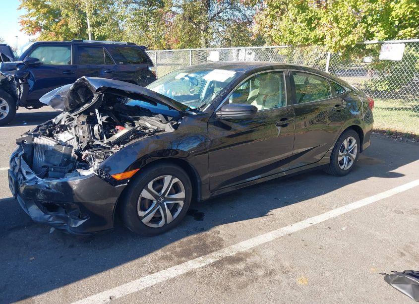 Photo 2 of 2018 Honda Civic LX (VIN 19XFC2F52JE209426)