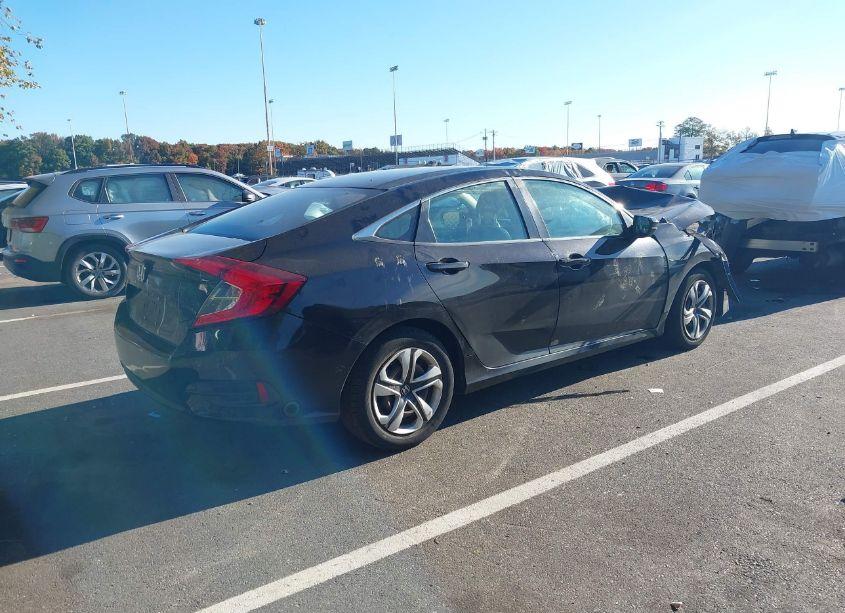 Photo 4 of 2018 Honda Civic LX (VIN 19XFC2F52JE209426)