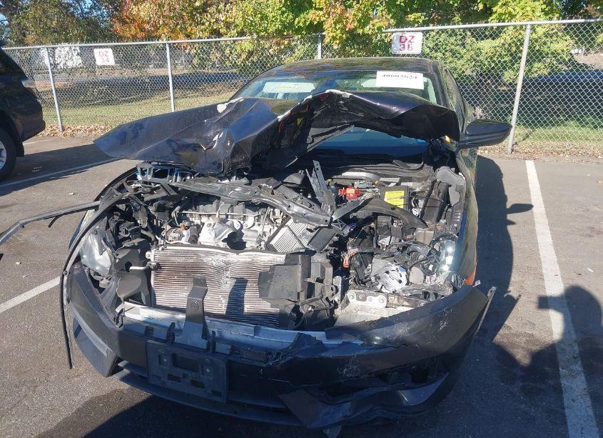 Photo 6 of 2018 Honda Civic LX (VIN 19XFC2F52JE209426)