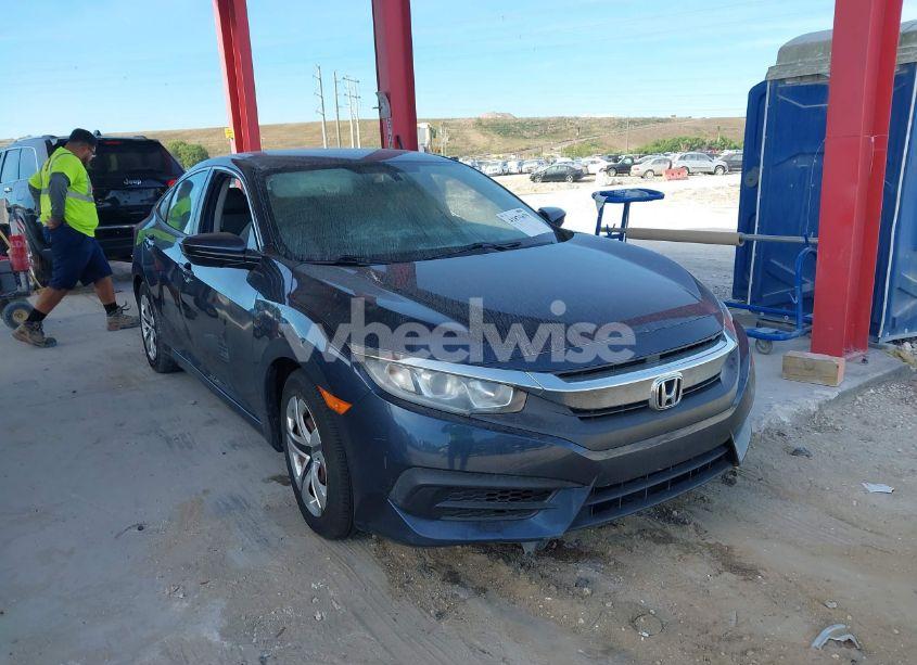 2017 Honda Civic LX (VIN 19XFC2F53HE000058) main photo