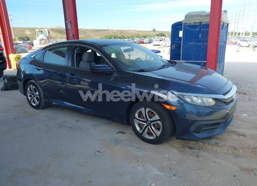 Photo 13 of 2017 Honda Civic LX (VIN 19XFC2F53HE000058)