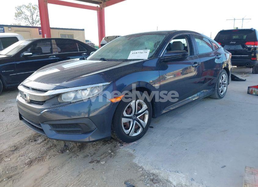Photo 2 of 2017 Honda Civic LX (VIN 19XFC2F53HE000058)
