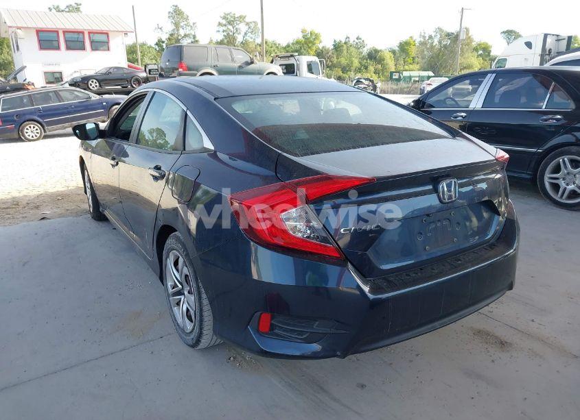Photo 3 of 2017 Honda Civic LX (VIN 19XFC2F53HE000058)