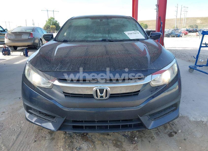 Photo 6 of 2017 Honda Civic LX (VIN 19XFC2F53HE000058)