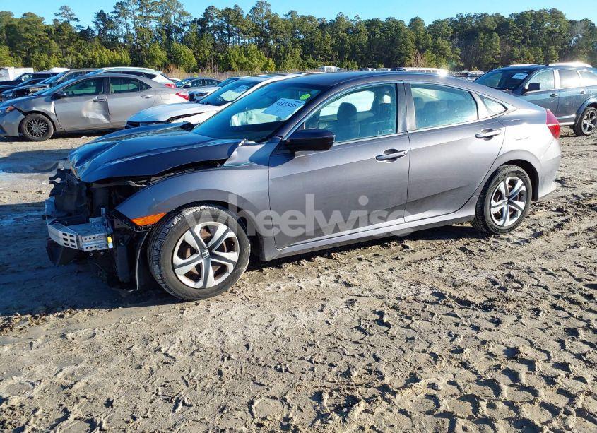 Photo 2 of 2017 Honda Civic LX (VIN 19XFC2F53HE007270)