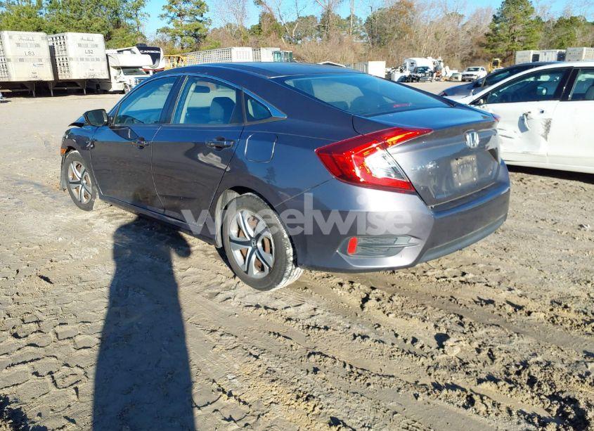 Photo 3 of 2017 Honda Civic LX (VIN 19XFC2F53HE007270)