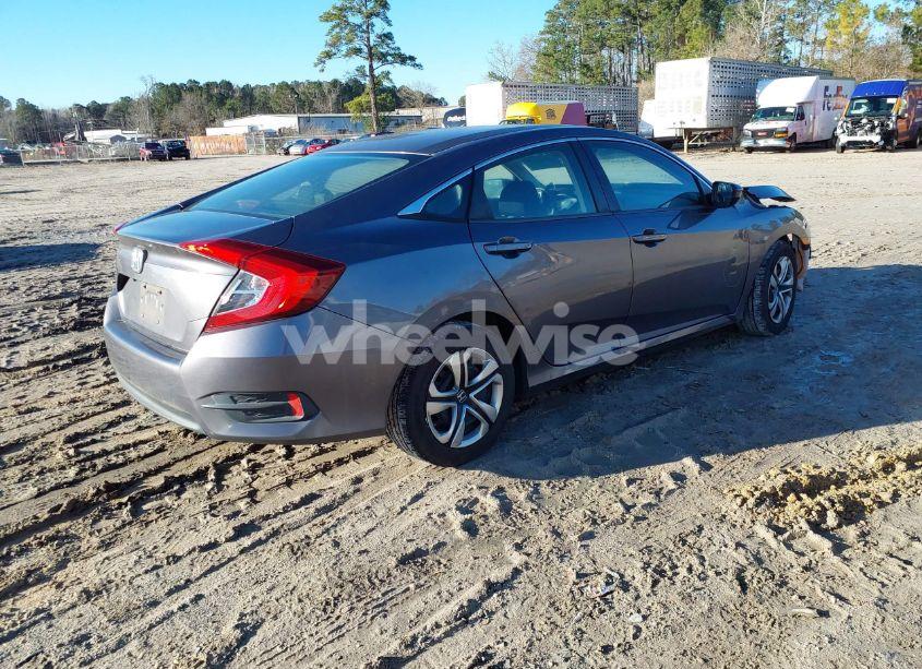 Photo 4 of 2017 Honda Civic LX (VIN 19XFC2F53HE007270)