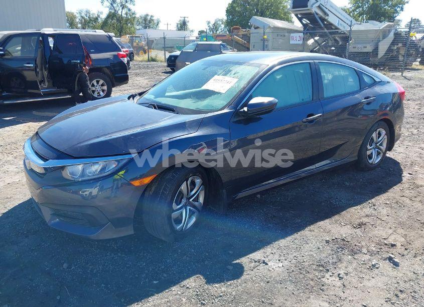 Photo 2 of 2017 Honda Civic LX (VIN 19XFC2F53HE032170)