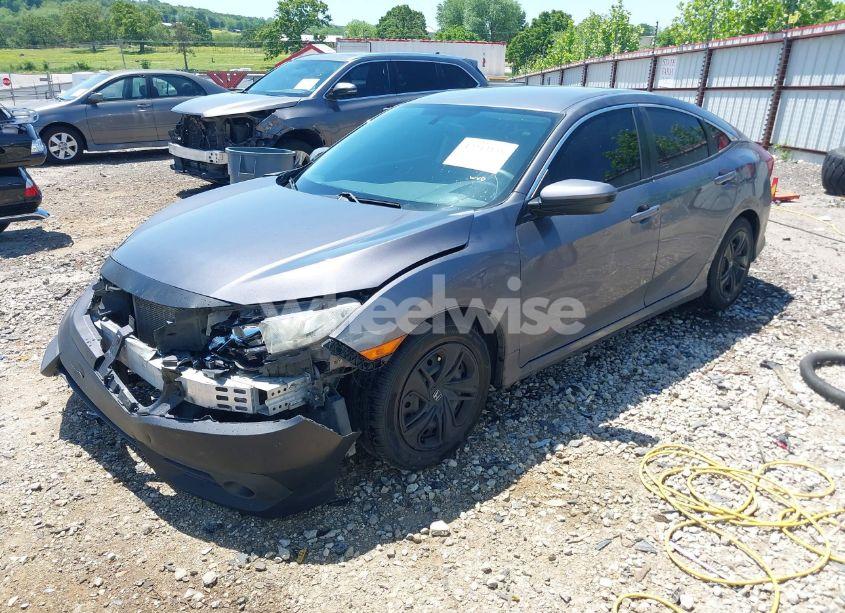 Photo 2 of 2017 Honda Civic LX (VIN 19XFC2F53HE044657)