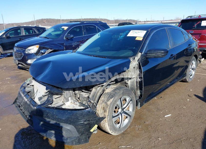 Photo 2 of 2017 Honda Civic LX (VIN 19XFC2F53HE073348)
