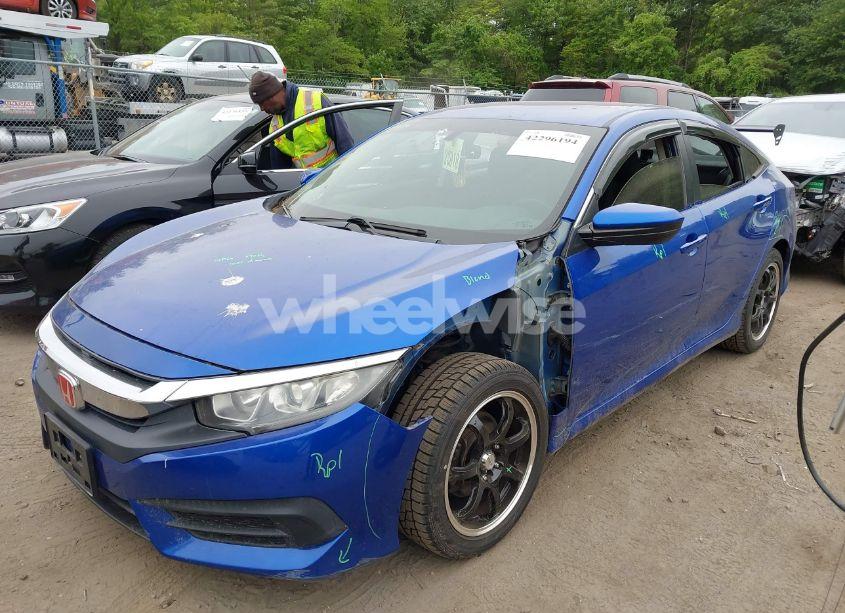 Photo 2 of 2017 Honda Civic LX (VIN 19XFC2F53HE217867)