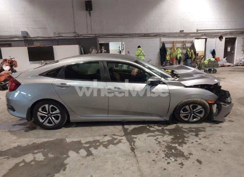 Photo 12 of 2017 Honda Civic LX (VIN 19XFC2F53HE231820)
