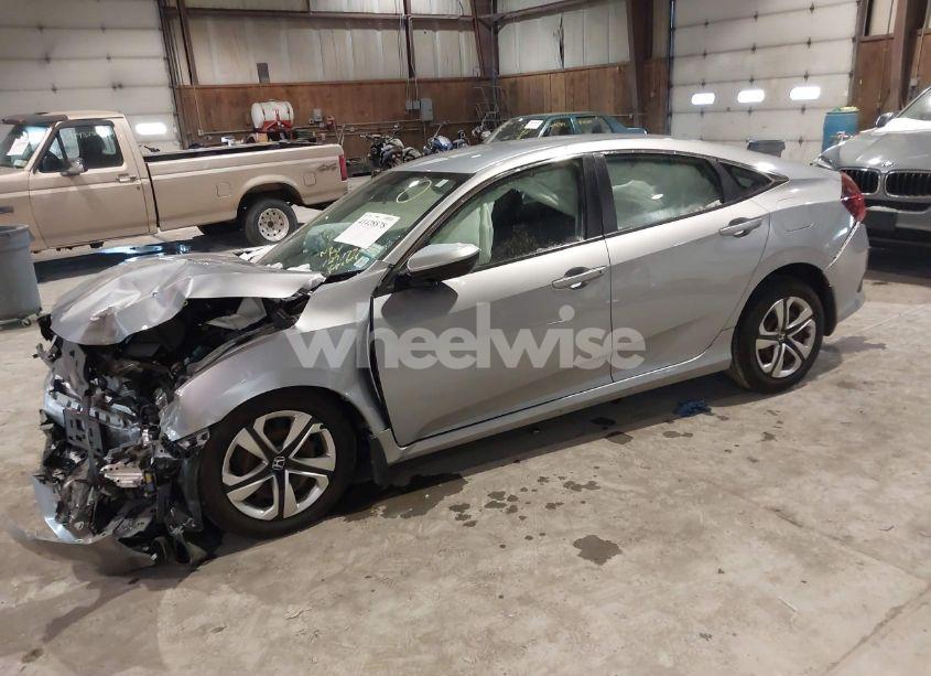 Photo 2 of 2017 Honda Civic LX (VIN 19XFC2F53HE231820)