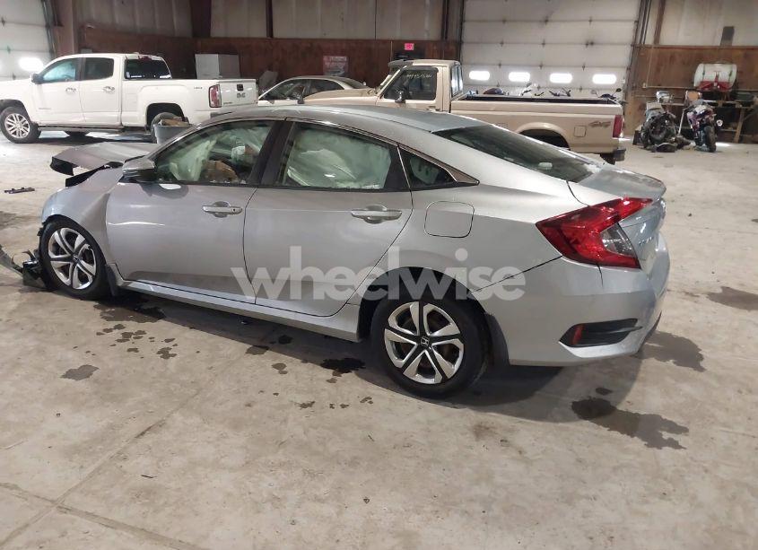 Photo 3 of 2017 Honda Civic LX (VIN 19XFC2F53HE231820)