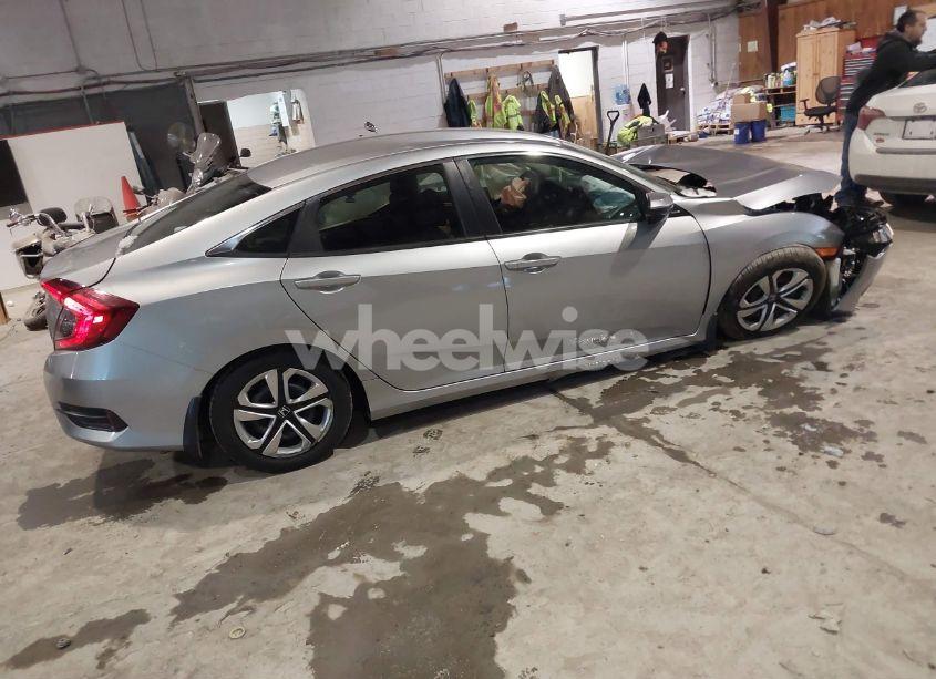 Photo 4 of 2017 Honda Civic LX (VIN 19XFC2F53HE231820)