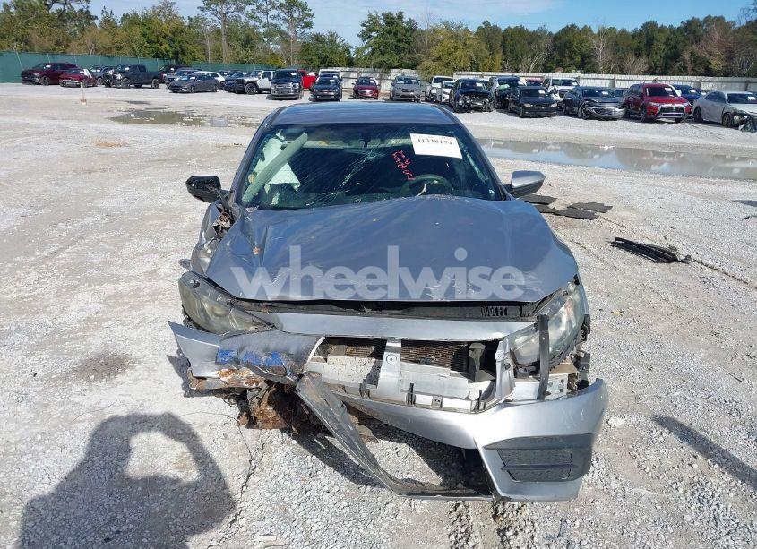 Photo 12 of 2018 Honda Civic LX (VIN 19XFC2F53JE002298)