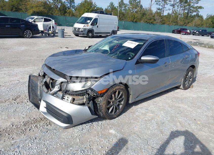 Photo 2 of 2018 Honda Civic LX (VIN 19XFC2F53JE002298)