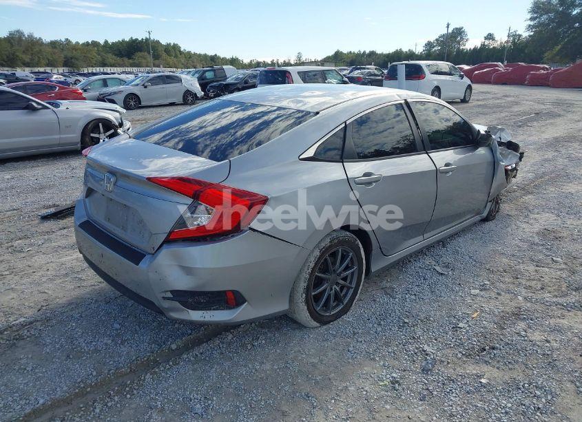 Photo 4 of 2018 Honda Civic LX (VIN 19XFC2F53JE002298)