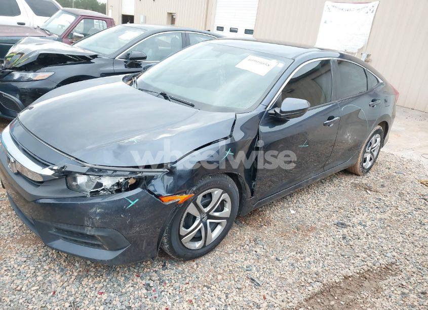 Photo 2 of 2018 Honda Civic LX (VIN 19XFC2F53JE006657)