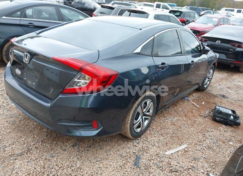 Photo 4 of 2018 Honda Civic LX (VIN 19XFC2F53JE006657)