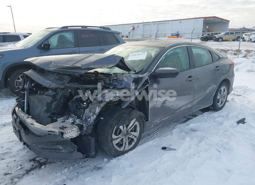 Photo 2 of 2018 Honda Civic LX (VIN 19XFC2F53JE014094)