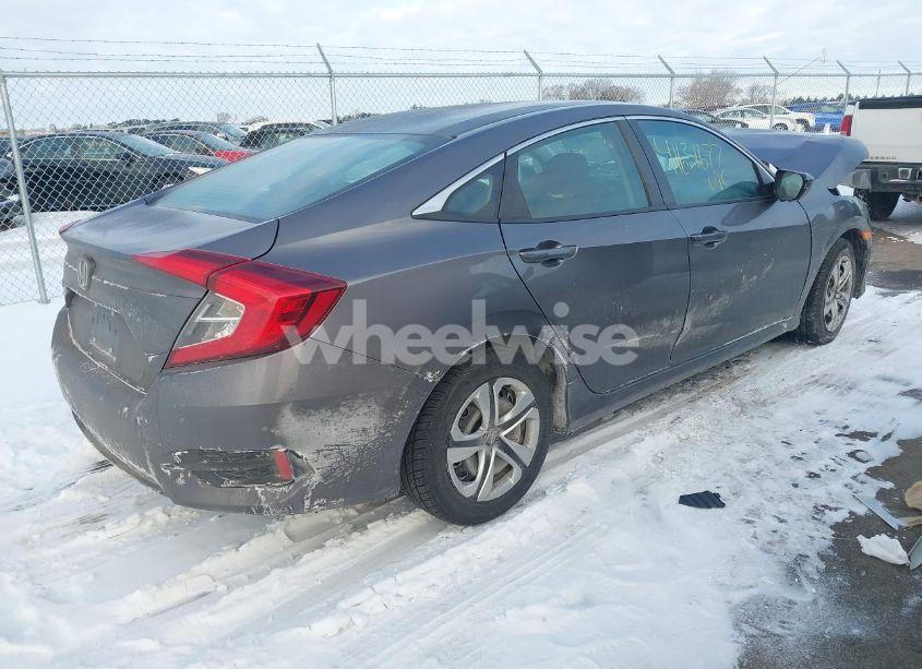 Photo 4 of 2018 Honda Civic LX (VIN 19XFC2F53JE014094)