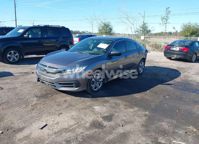 Photo 2 of 2018 Honda Civic LX (VIN 19XFC2F53JE027959)