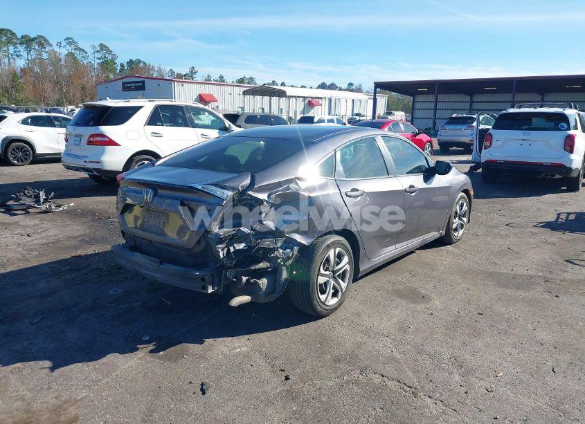 Photo 4 of 2018 Honda Civic LX (VIN 19XFC2F53JE027959)