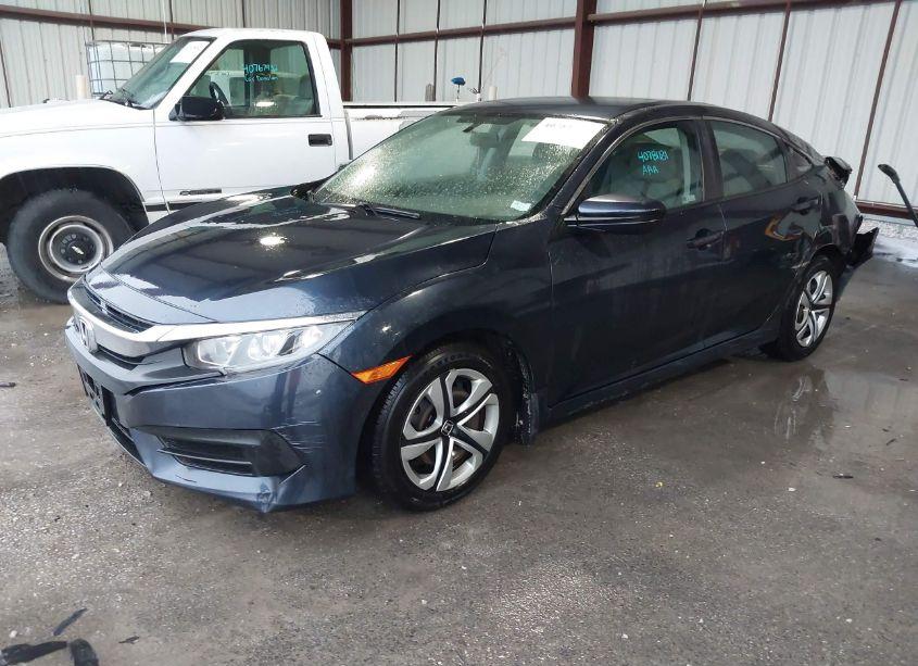 Photo 2 of 2018 Honda Civic LX (VIN 19XFC2F53JE032451)
