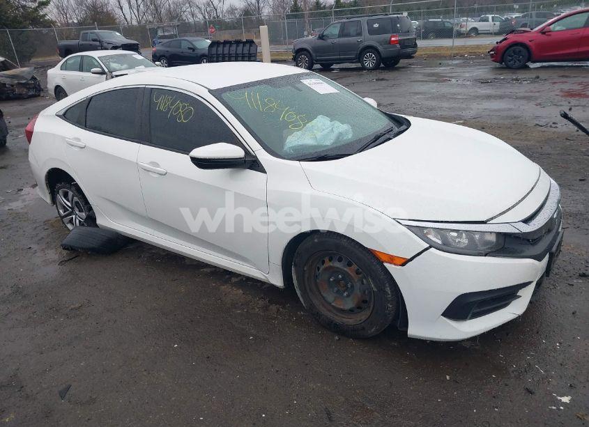 2018 Honda Civic LX (VIN 19XFC2F53JE040808) main photo