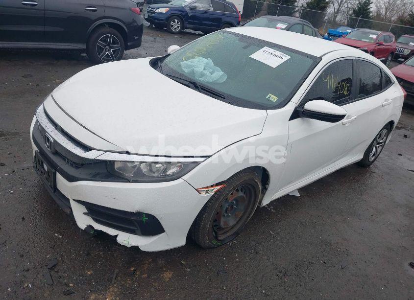 Photo 2 of 2018 Honda Civic LX (VIN 19XFC2F53JE040808)