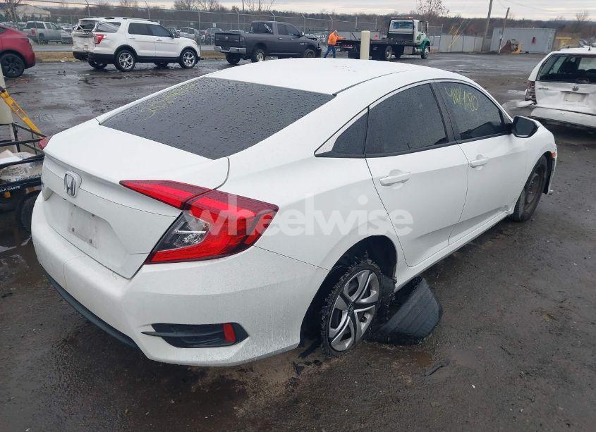 Photo 4 of 2018 Honda Civic LX (VIN 19XFC2F53JE040808)