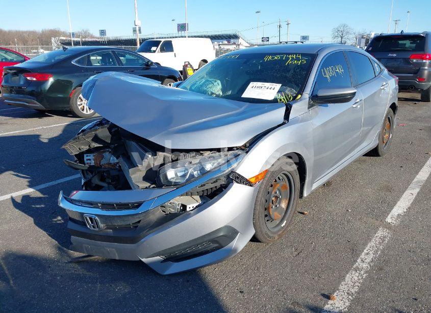 Photo 2 of 2018 Honda Civic LX (VIN 19XFC2F53JE201447)