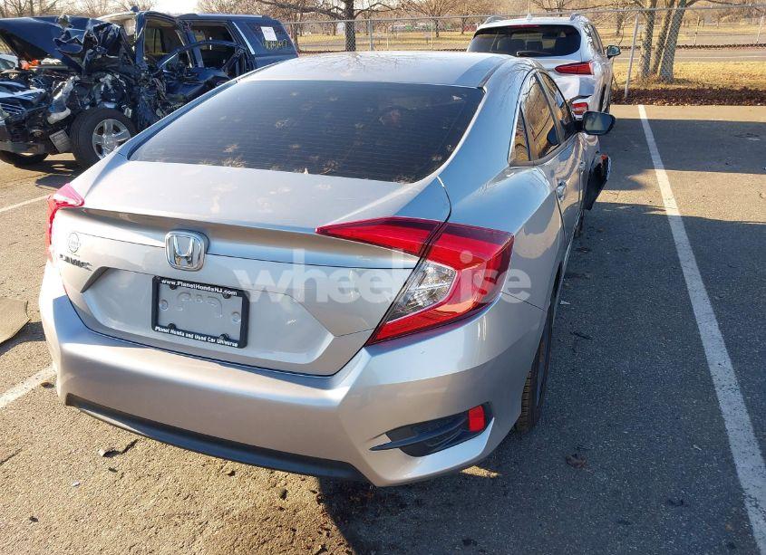 Photo 4 of 2018 Honda Civic LX (VIN 19XFC2F53JE201447)