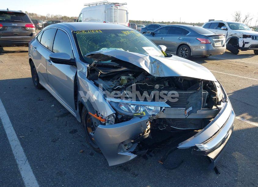Photo 6 of 2018 Honda Civic LX (VIN 19XFC2F53JE201447)