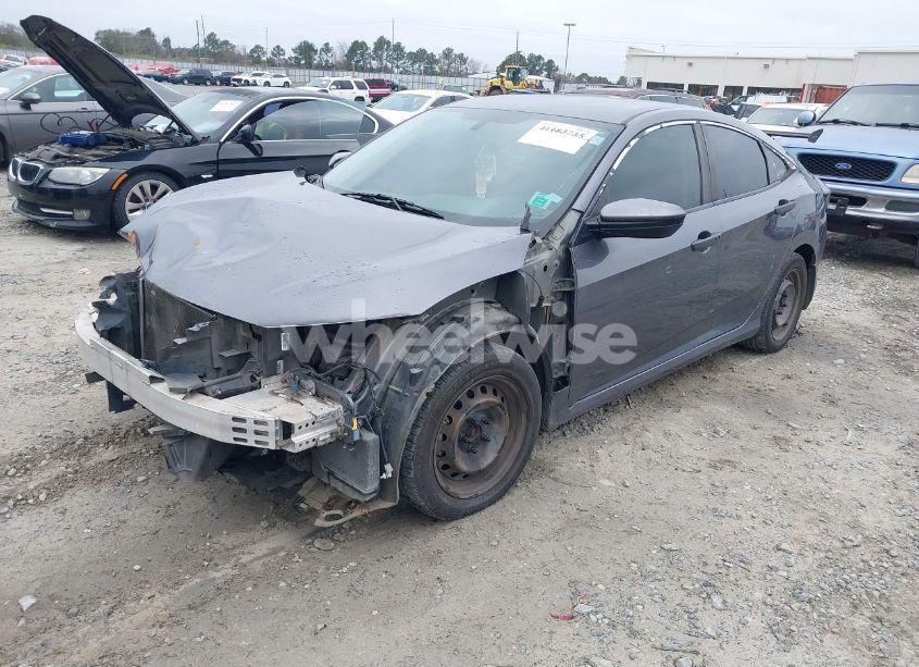 Photo 2 of 2017 Honda Civic LX (VIN 19XFC2F54HE000568)
