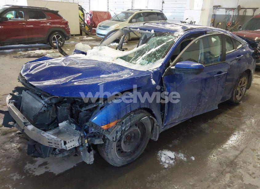 Photo 2 of 2017 Honda Civic LX (VIN 19XFC2F54HE010002)