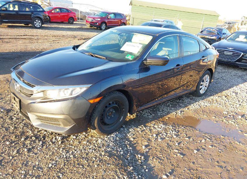 Photo 2 of 2017 Honda Civic LX (VIN 19XFC2F54HE211222)
