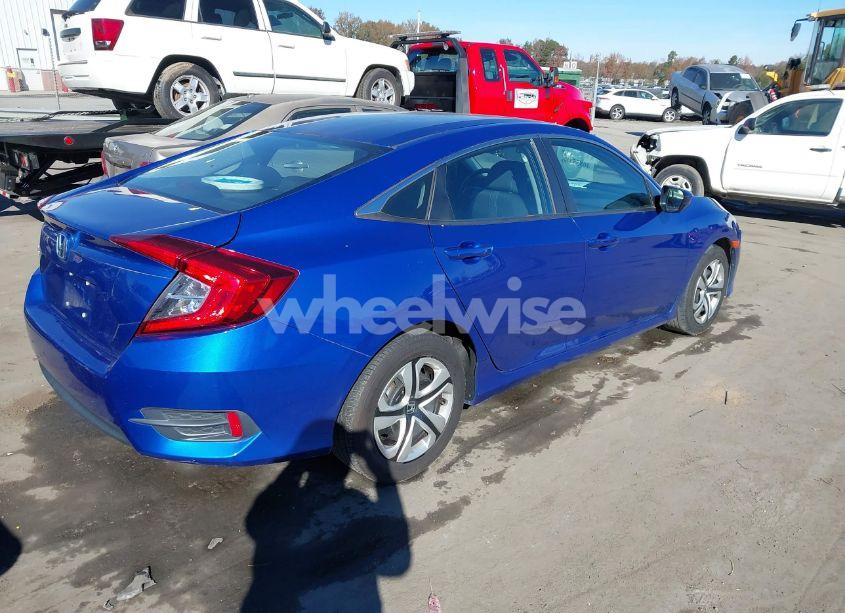 Photo 4 of 2017 Honda Civic LX (VIN 19XFC2F54HE227906)