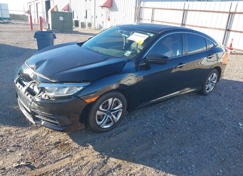 Photo 2 of 2018 Honda Civic LX (VIN 19XFC2F54JE001516)
